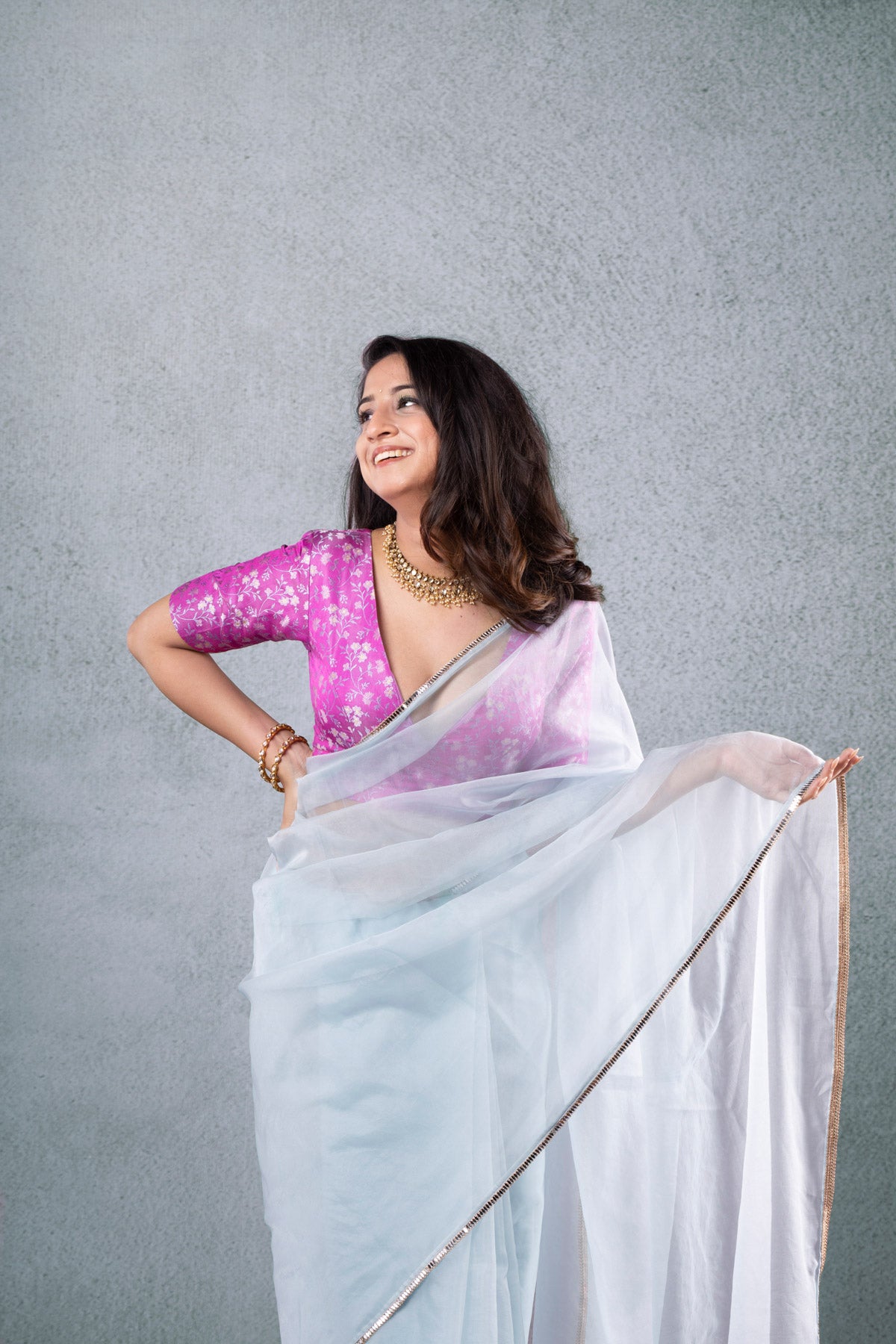 Pink Brocade Blouse with Light Blue Saree