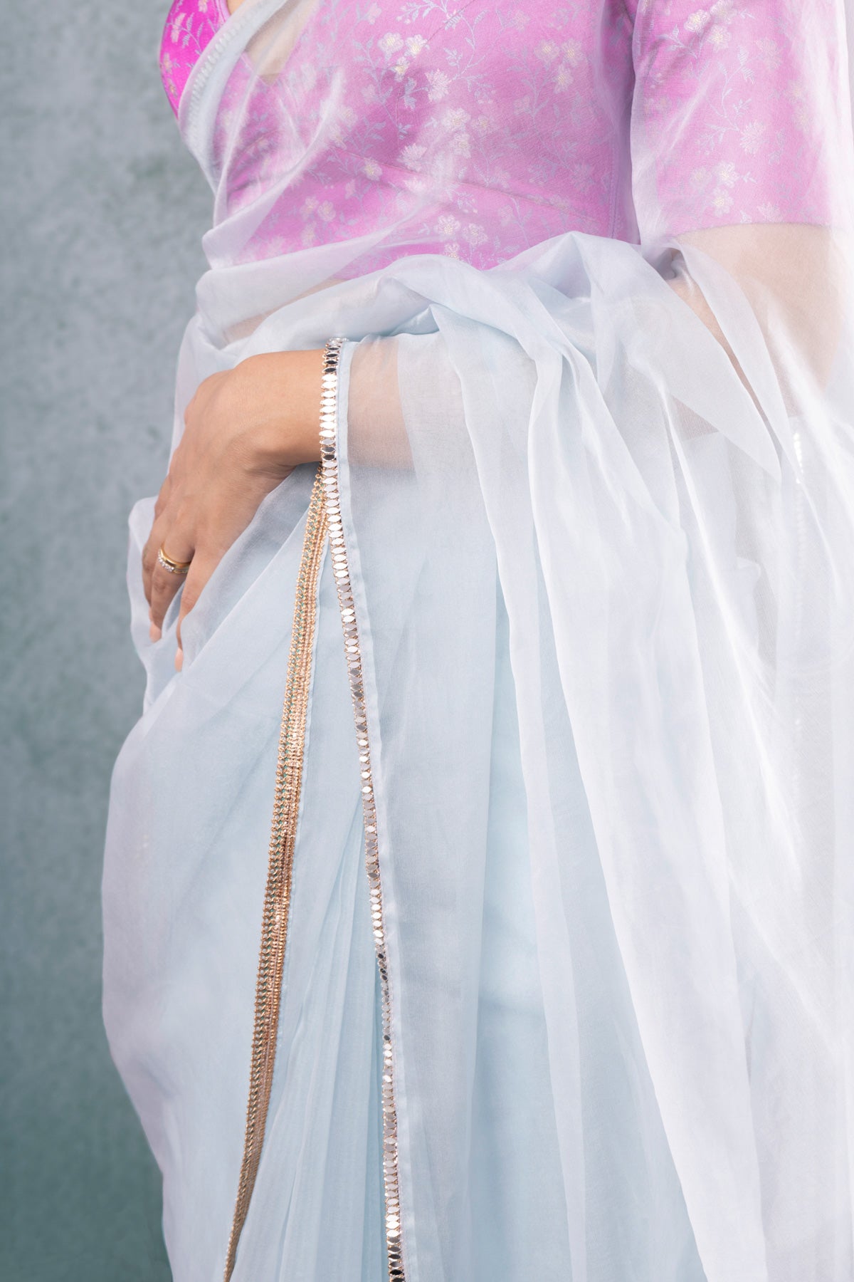 Pink Brocade Blouse with Light Blue Saree