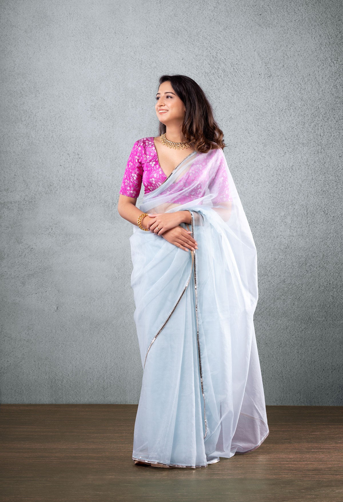 Pink Brocade Blouse with Light Blue Saree