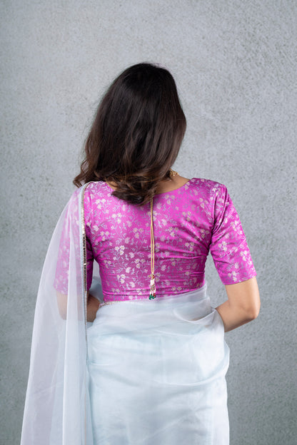 Pink Brocade Blouse with Light Blue Saree